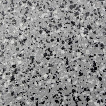 Granite - "Granite polyaspartic flooring with a speckled mix of grays, whites, and black flecks, offering a natural stone look that is both durable and elegant, perfect for a classic and refined garage finish."